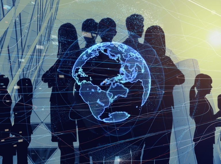 Professionals collaborating around a digital network